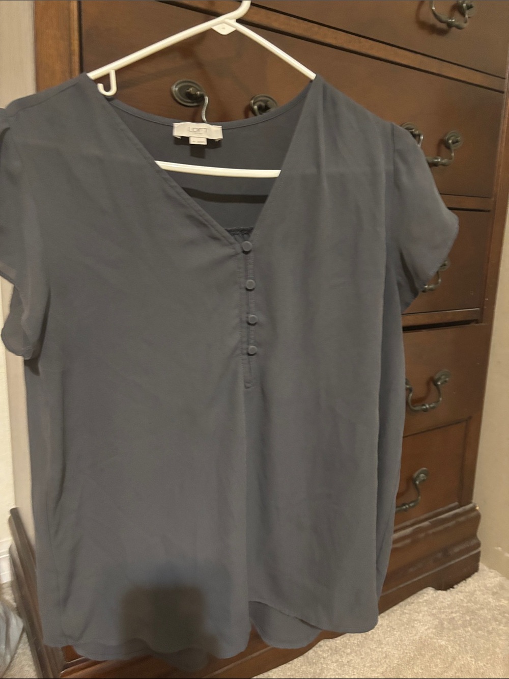 Henley style tulip sleeve blouse